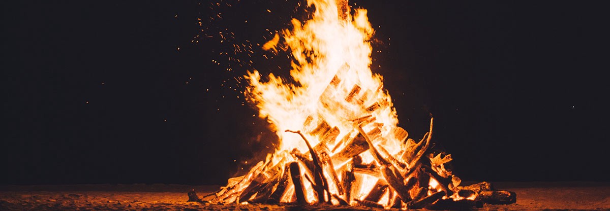 big fireplace outside burning